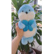 Gấu bông rái cá cầm bông hoa